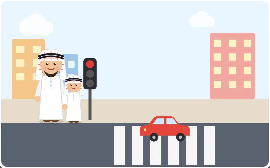 أَقِفُ عِنْدَ الْإِشَارَةِ الْحَمْرَاءِ وَأُمْسِكُ يَدَ أَبِي